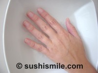Nigiri Sushi Hand befeuchten